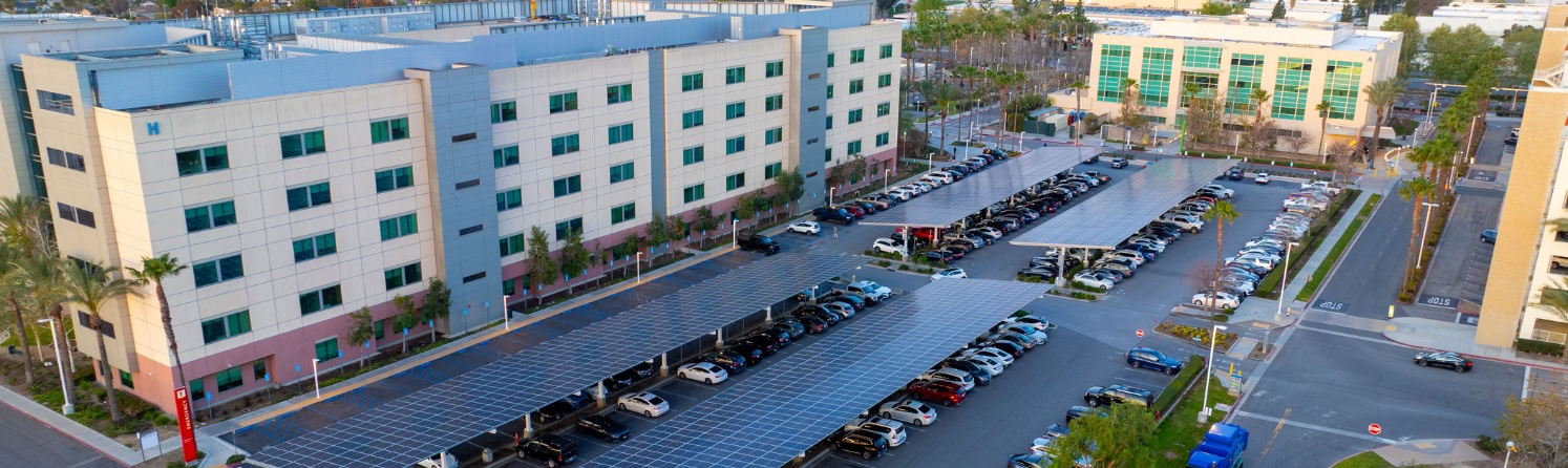 solar panels parking lot kaiser permanente faraday microgrids
